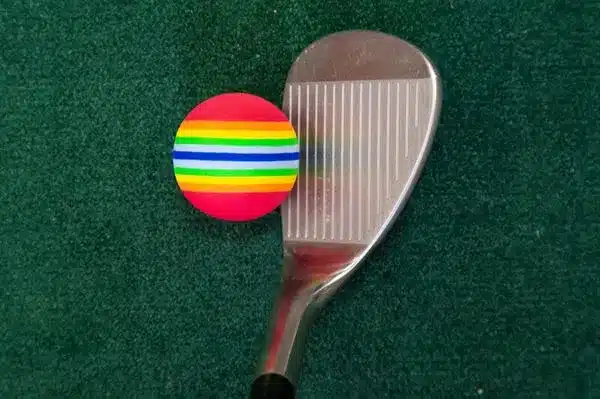 Longridge Multi-coloured Foam Ball set up with a golf club.