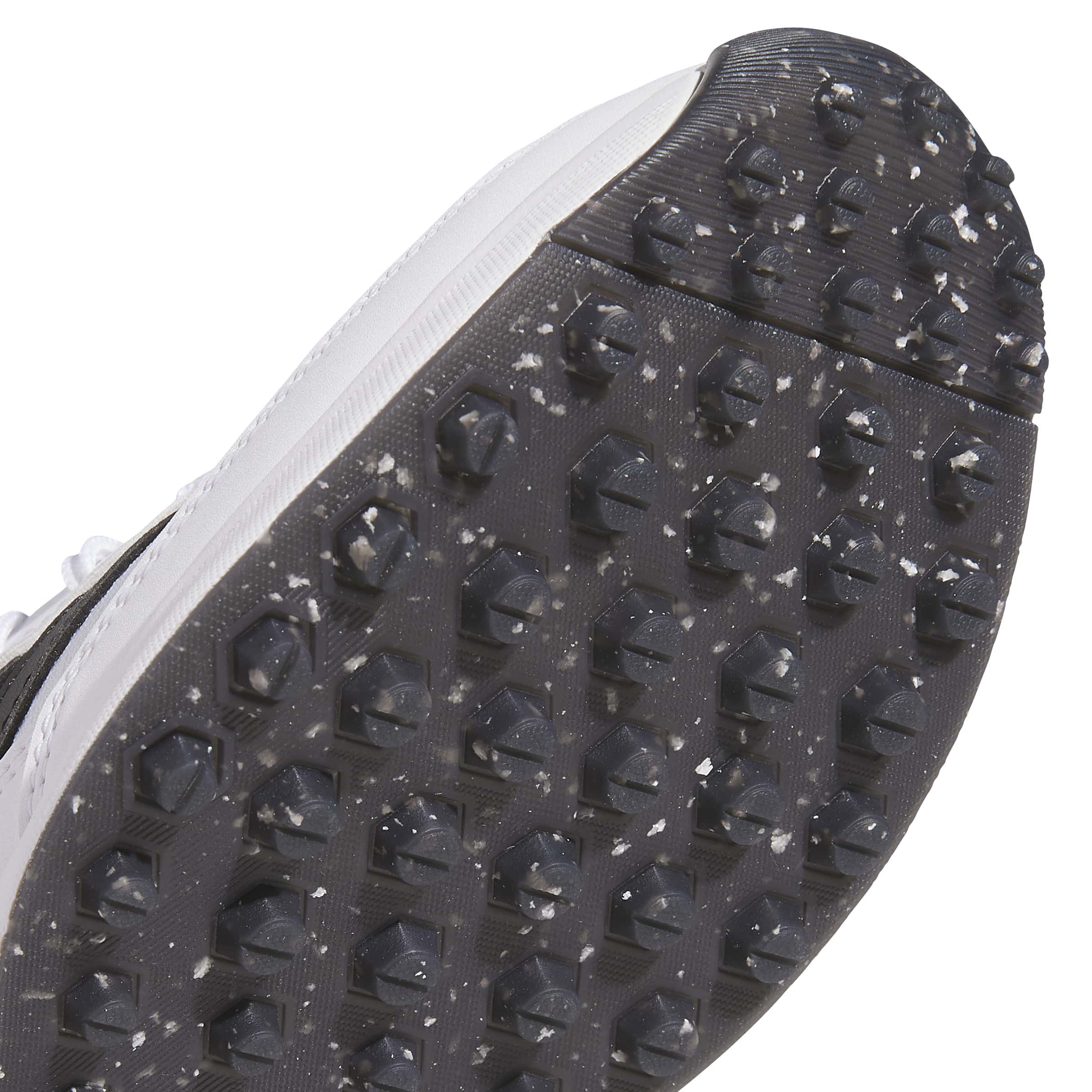 close up of the sole of a White, black and red adidas S2G junior golf shoe