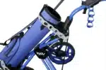 An unfolded Rovic RV3J Junior golf Trolley in Blue carrying a golf bag.