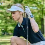 Voice Caddie A2 Golf GPS Watch as being warn by a female golfer.