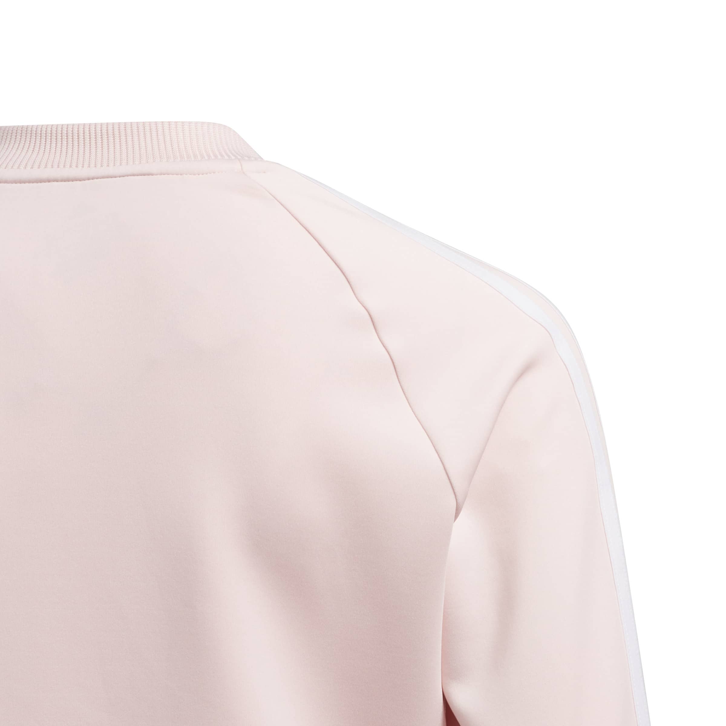 Close up of the mock top adidas girls jumper in pink showing the collar line.