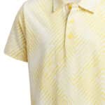 Close up of the 3 button collar on this yellow patterned boys golf polo shirt.