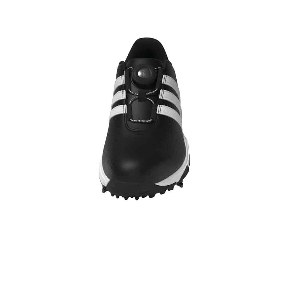 Junior golfer tying Adidas Tour360 24 BOA shoes with BOA system